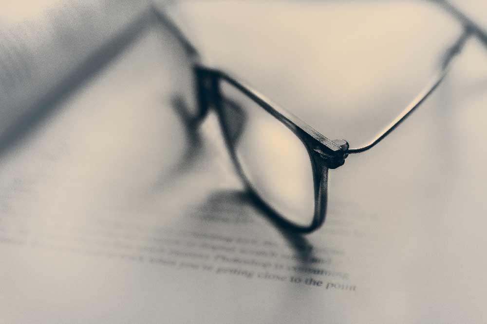 Copyediting is the correcting stage where inconsistent or incorrect spelling, grammar and punctuation are attended to, and where logic is checked, such that the reader is allowed to follow the story without distraction.